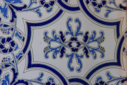 blue and white terracotta glaze tiles in spain traditional decoration background photo