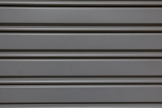 interesting original gray metal background in close-up photo