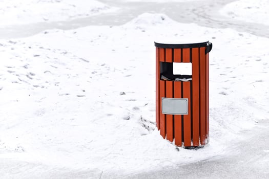 Garbage bin in winter photo