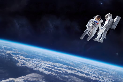 illustration of astronauts in space above earth photo