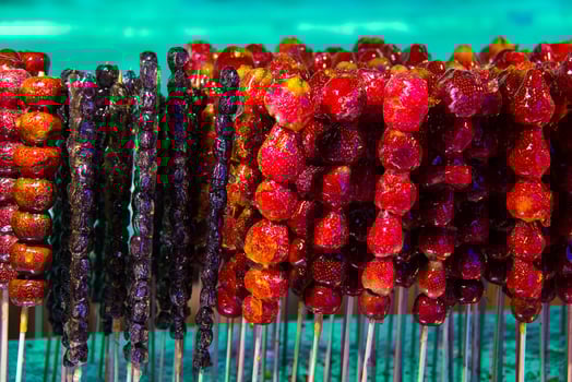 Tang hulu or Chinese sugar-coated fruit stick. The snack of China in the Winter. photo