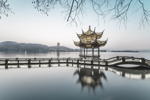 beautiful hangzhou in sunset and ancient pavilion photo