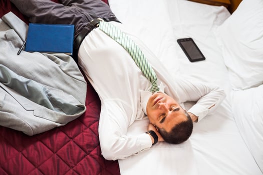 A businessman in a hotel room photo