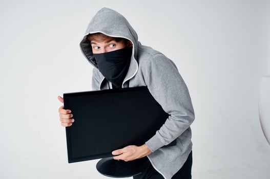 male thief hooded head hacking technology security isolated background photo