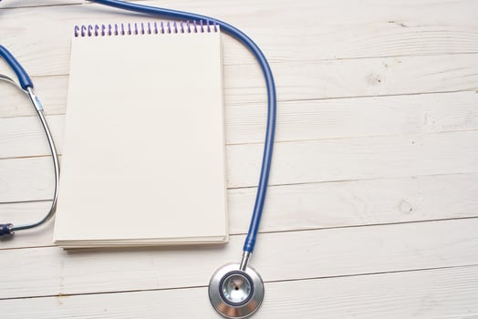 stethoscope with notepad hospital health care photo