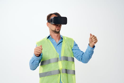 man in working uniform building vr glasses photo