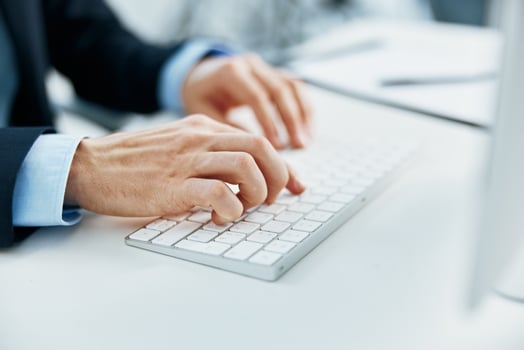 typing on the keyboard desktop Office manager photo