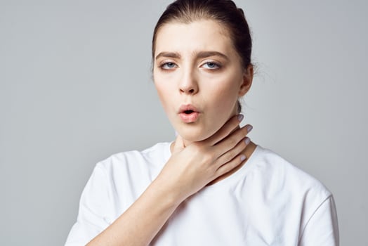 woman in white t-shirt pain health problems treatment hospital photo