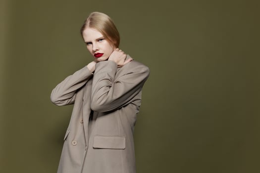 glamorous woman with red lips coat bright makeup isolated background photo