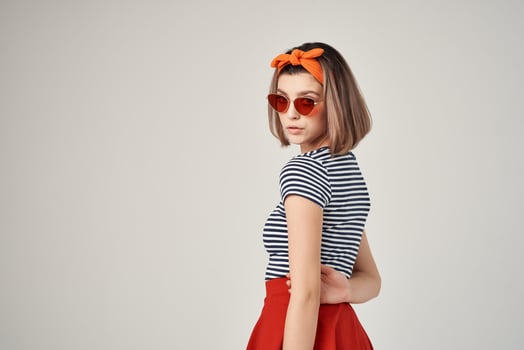 woman in striped t-shirt with bandage on her head wearing sunglasses fashion summer photo