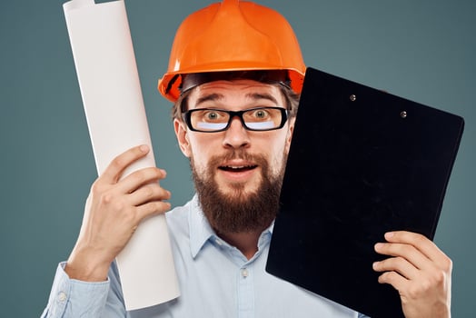 emotional worker in orange paint paperwork construction lifestyle fun photo