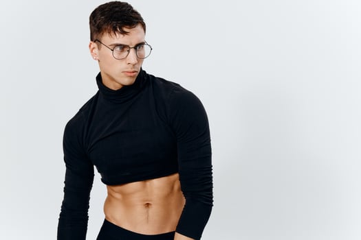 portrait of a young guy with a pumped-up torso bodybuilder sweater photo