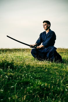 Kendo fighter holding bokuto photo