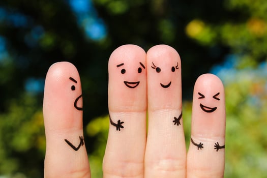 Finger art of people. The concept of a man scolds of people, they laugh. photo