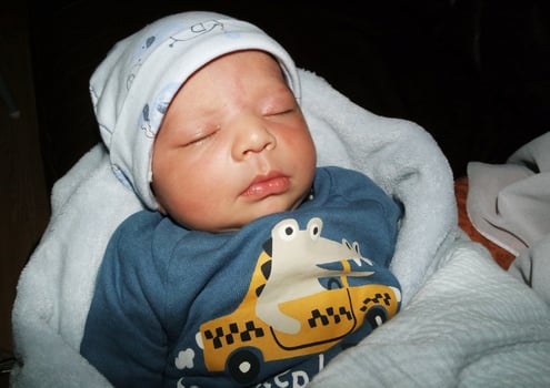 New Born Asian Pakistan Baby Boy is Relaxing. He is Named Azlan Ahmed Shah, Born on 14-March-2023 at Luton and Dunstable Hospital at Luton England UK. Image Captured on 20-March-2023 photo