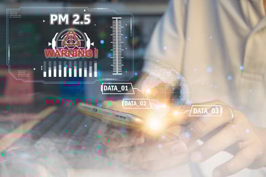 The concept of using a smartphone device To detect PM2.5 dust in the air photo