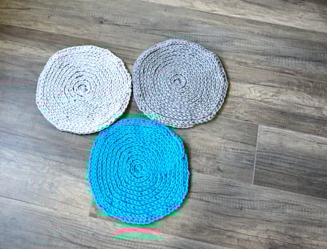 grey handmade cottoncord tablecloths on crochet hook photo