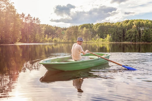 Fisherman in a boat photo