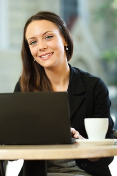 A woman hanging out at a coffee shop photo