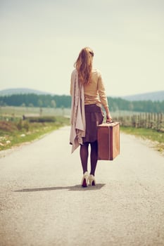 A woman on the road photo