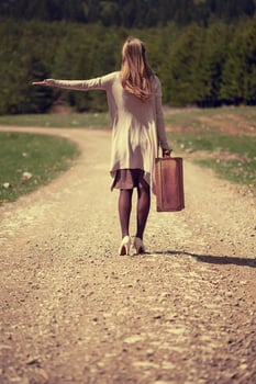 A woman on the road photo