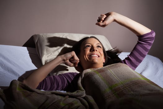 A young woman resting in the bed photo