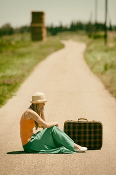 A woman on the road photo