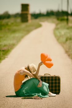 A woman on the road photo