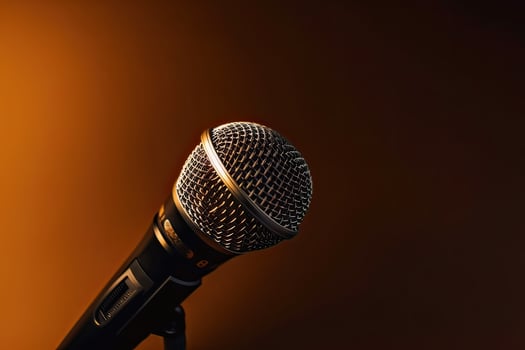 Close-up microphone. microphone isolated on vibrant background, banner with copy space. . photo