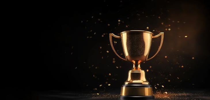 , Winner trophy with flames, golden champion cup with falling confetti on dark background photo