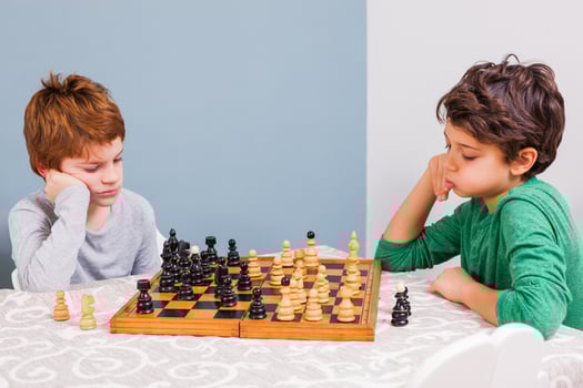 Kids playing chess photo
