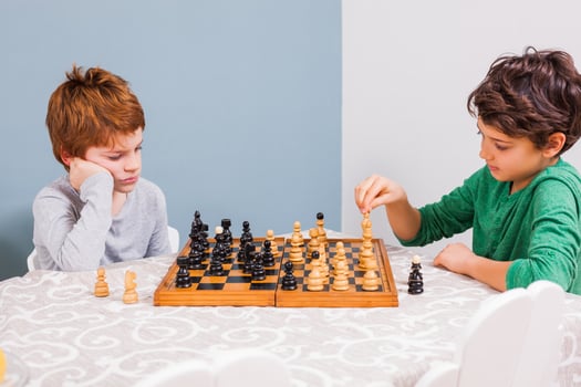 Kids playing chess photo