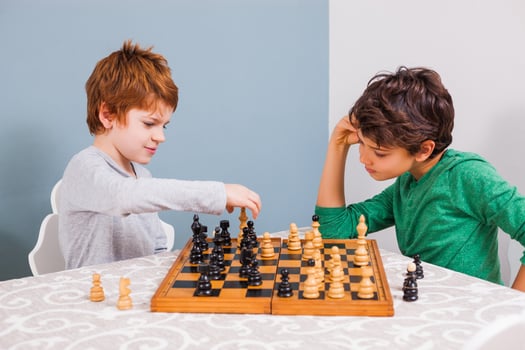 Kids playing chess photo