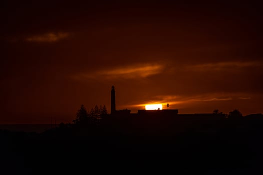 colorful sunset on the Spanish island of Gran Canaria in the Maspalomas dunes photo