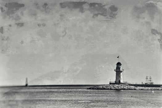 photo of a beach in Turkey in Alanya on a beautiful summer day stylized as an old photographA beautiful photo of a beach in Turkey in Alanya on a beautiful summer day stylized as an old photograph