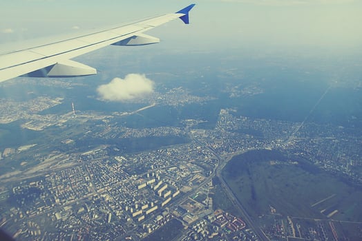 original view of the city of Warsaw in Poland from a flying plane photo