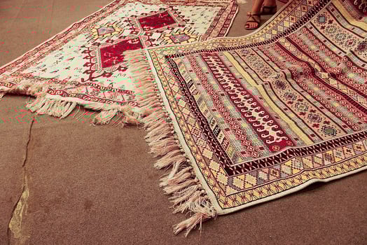 interesting background with handmade Turkish rugs in close-up photo