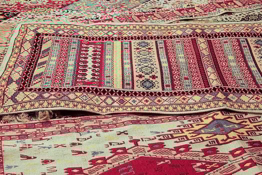 interesting background with handmade Turkish rugs in close-up photo