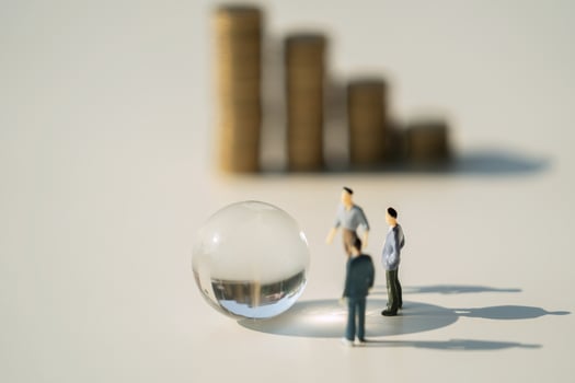 business miniature toy with globe glass on white background photo