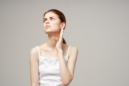 woman ear pain otitis media health problems infection light background photo