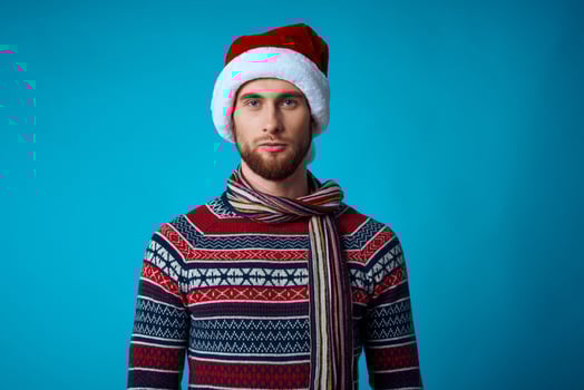 handsome man with a phone in hand holiday christmas technology studio posing photo
