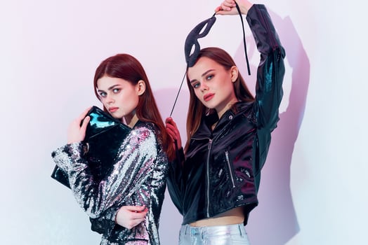 two glamorous women fashion clothing modern style party nightclub photo