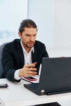 manager at the desk documents technology photo