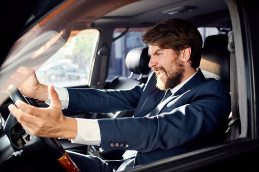 bearded man Driving a car trip luxury lifestyle rich photo