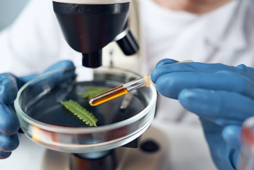 female laboratory assistant arranging spectroscope research science biotechnology photo