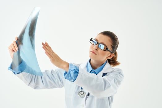 female doctor in white coat x-ray health diagnosis radiologist photo