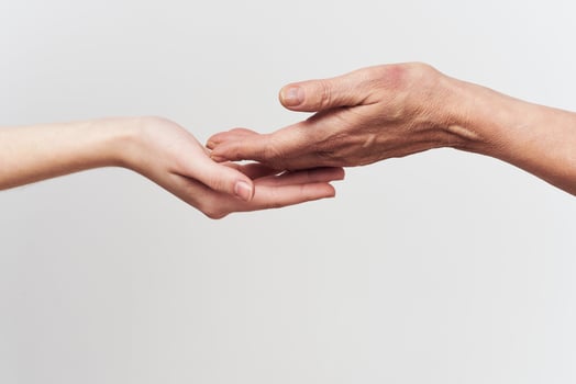 two hands close-up holding each other family help photo