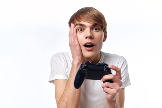 guy with joystick in hand video games entertainment light background photo