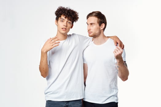 two men are standing next to clean t-shirts emotions photo