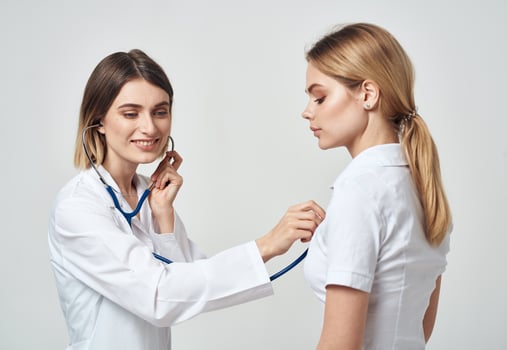 professional doctor with stethoscope heartbeat patient health work photo